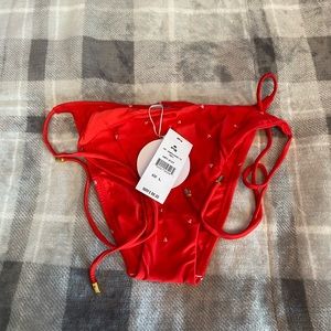 PilyQ Pq Swim L heart bottoms. NWT